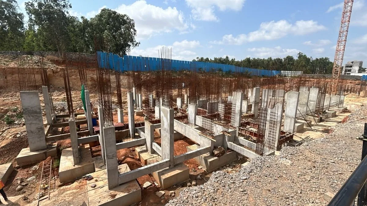 Retaining wall and foundation works along the site edge — Casagrand Estancia, Kogilu, Bengaluru