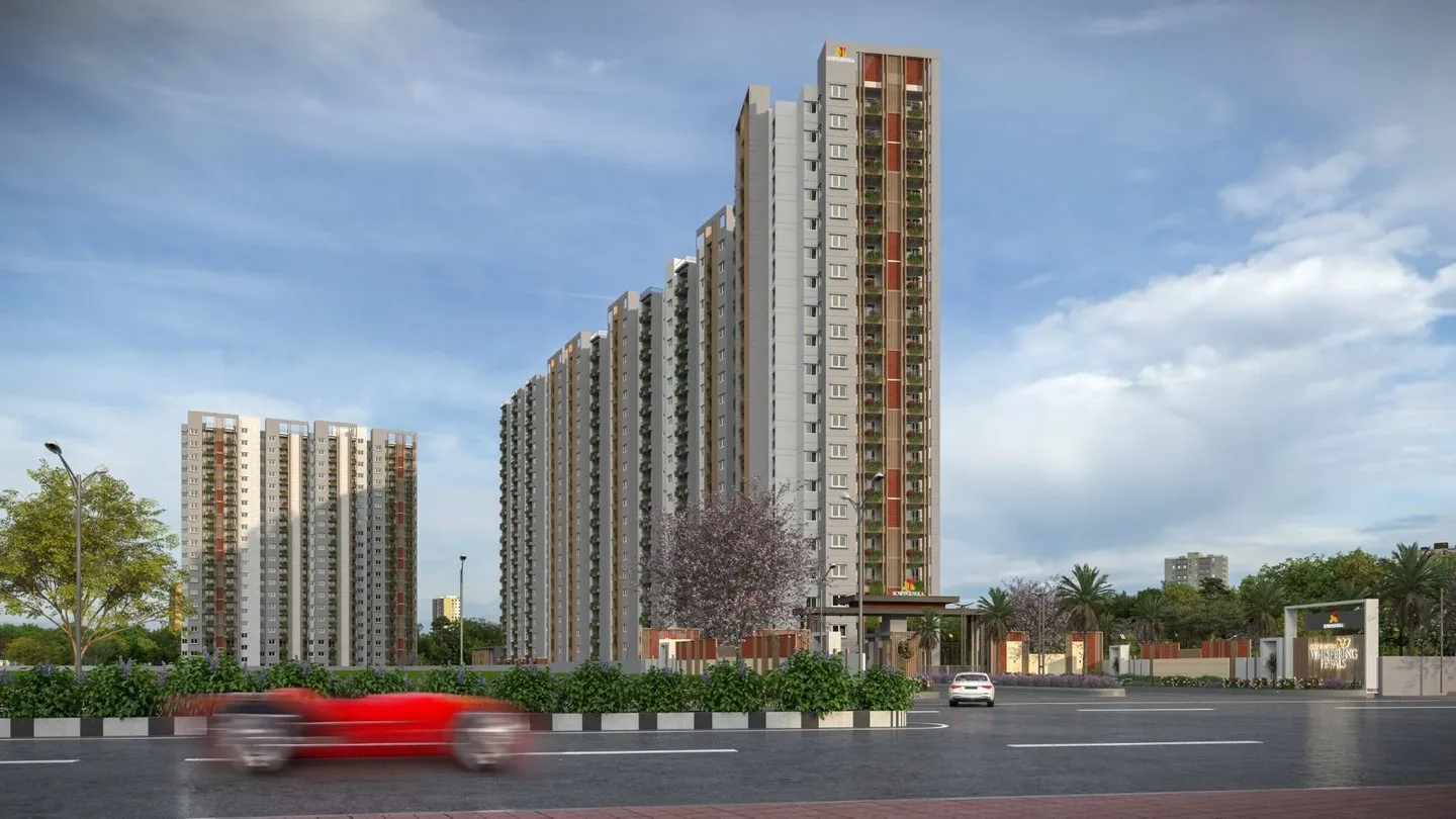 Towers from the approach road — Sowparnika Whispering Petals, Bengaluru